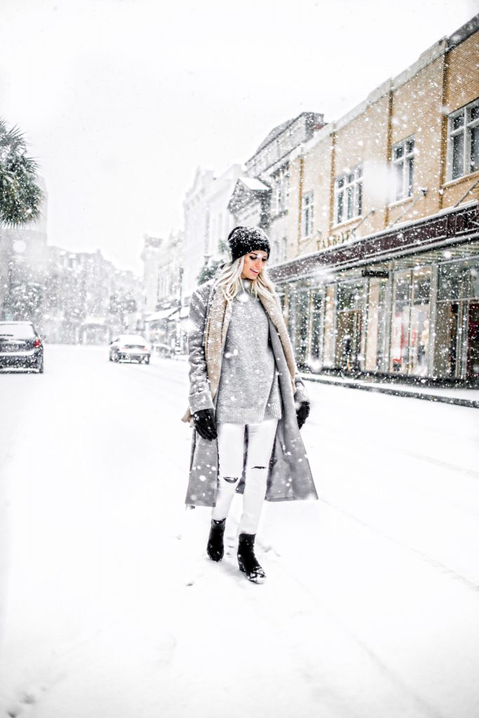 Snow in Charleston SC king street January 4th 2018 white skinny jeans gray wool long coat forever 21 black ankle boots beanie gray knit sweater turtleneck Charleston Fashion Blogger Dannon Like The Yogurt