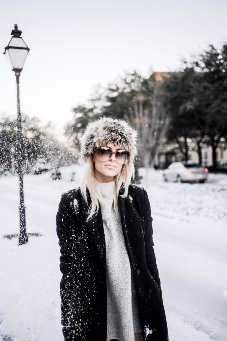 Snow Bunny in Charleston SC king street January 4th 2018 faux fur hat oversized sunglasses thigh high boots H&M forever 21 black coat high neck sweater Charleston Fashion Blogger Dannon Like The Yogurt