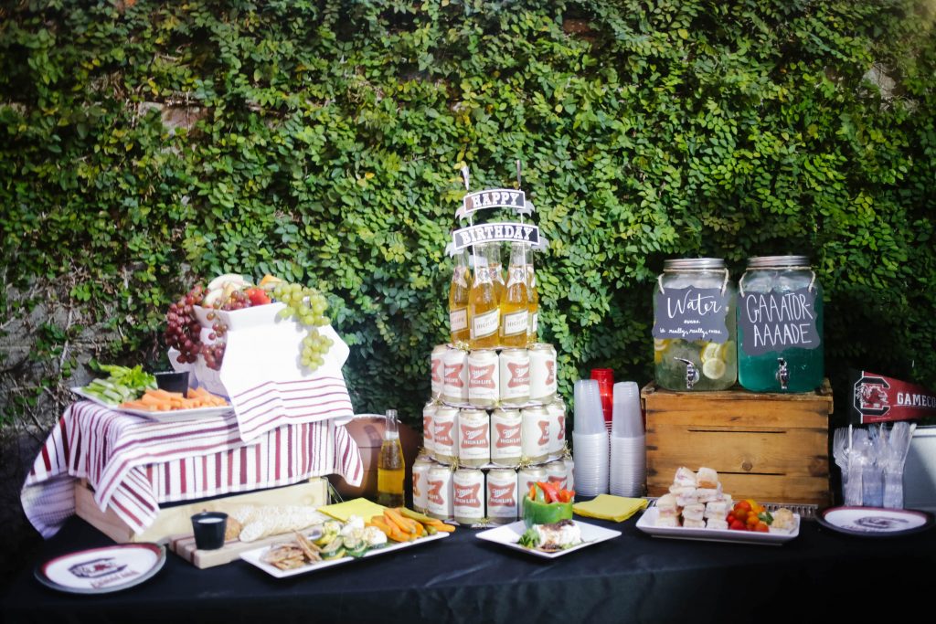 carolina gamecocks tailgate themed party // charleston fashion lifestyle blogger dannon k collard hammy catering beer tower high life miller birthday cake